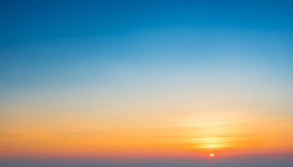 Wall Mural - abstract gradient sunrise in the sky with blue and orange natural background