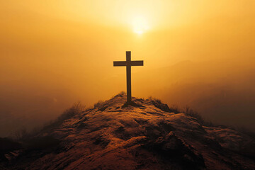 Wall Mural - Cross on hilltop at sunset, golden sky creating serene and spiritual atmosphere, symbol of faith and hope