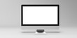 © Andres Mejia - Modern desktop computer showing white blank screen on grey background