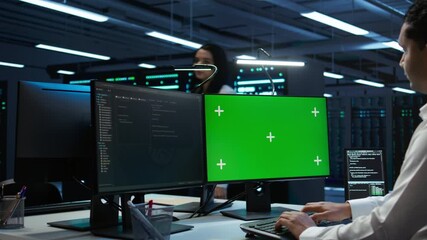 Poster - system administrator in data center installing software on isolated screen pc, troubleshooting issue