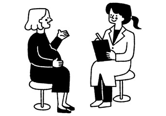 Wall Mural - A woman talking to a female doctor during a pregnancy checkup_2