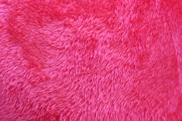 Wall Mural - Artificial red fur texture with bright soft smooth patterns on background
