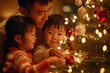 © TANAT - Asian dad and children decorating the Christmas tree together, stringing lights and ornaments