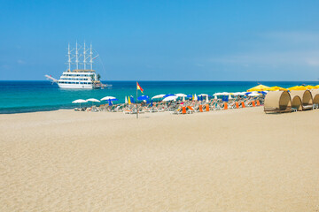 Sticker - Famous Cleopatra beach in Alanya in Turkey at summer day, popular tourist destination in Turkey.