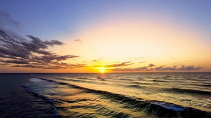 Wall Mural - Sunset over the ocean with vibrant sky