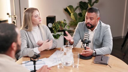 Fototapete - Podcast, meeting and people with documents in discussion for talk show, broadcast or celebrity news update. Paper, info and host with mic at desk for conversation, live streaming and content creation