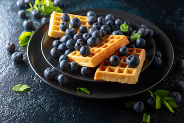 Wall Mural - Belgian waffles with blueberries.