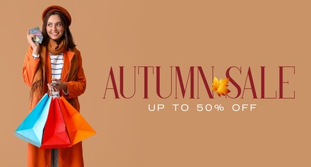 Canvas Print - Banner for autumn sale with with young woman holding mobile phone, shopping bags and credit cards