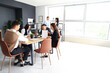 © Pixel-Shot - Business people negotiating at table in conference hall