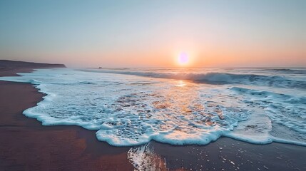 Sticker - Serene Sunrise Over Quiet Beach with Gentle Waves Washing Ashore