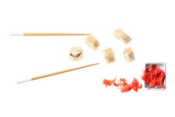 Wall Mural - Tasty flying sushi rolls, ginger and chopsticks on white background