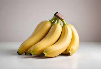 A bunch of ripe bananas isolated with a greyish background. 