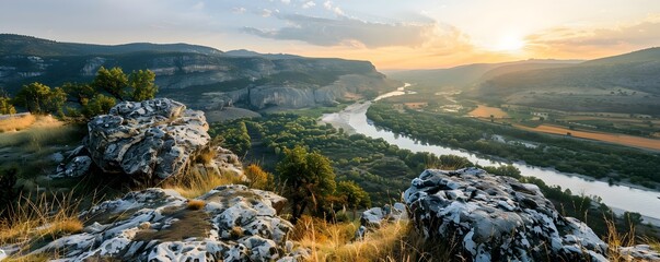 Canvas Print - Scenic Overlook of Winding River and Rolling Hills in the Distance Hiking Concept with Copy Space