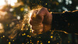 © VK Studio - A powerful fist clenched mid-motion against a background of golden light and glowing particles, symbolizing strength and energy.