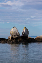 Wall Mural - Beautiful day view of Split Apple Rock, New Zealand.