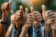 © At My Hat - A group of people are giving thumbs up to each other. Concept of positivity and unity among the group