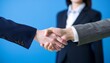 © 和正 住原 - Handshake to confirm a deal.