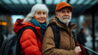 © Alena - The elderly couple stands with their belongings at customs, ready to move to a new country, highlighting their courage and adventurous journey toward a fresh start.