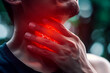 © K2Kstock - Man holding sore throat with red marks. Throat problem concept