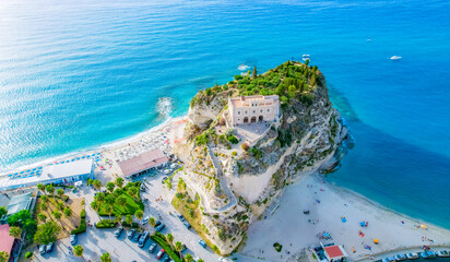 Wall Mural - Tropea, Calabria, Italy. Church of Santa Maria dell'Isola. Monastery and coastline with azure crystal-clear water