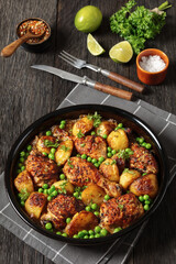 Poster - Chicken Vesuvio in a baking dish, top view