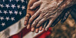 © LdelaF - Joined hands of different ethnicities with the United States flag in the background