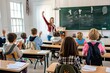 © Alina Zavhorodnii - A schoolboy raises his hand up sitting at a desk in the background of a classroom with other students