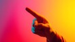 © sarana - Pointing Finger: A hand pointing directly at the viewer with a gradient background.