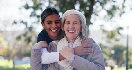 Wall Mural - Senior woman, nurse and caregiver with hug in nature for love, support or care at outdoor park. Portrait of elderly patient or physiotherapist with smile for embrace, commitment or trust together