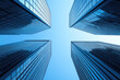 © Oranuch - A stunning view of modern skyscrapers against a clear blue sky, showcasing the impressive architecture and urban landscape of the city.