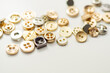 © Q77photo - A pile of buttons of various shapes and sizes