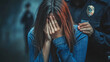 © Mel - a young woman crime victim covering face with hands standing back with policeman