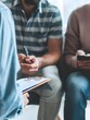 © Pascal - Professional family therapist having conversation with married couple. Crop male psychotherapist holding pen and clipboard and making notes while discussing relationship problem during therapy