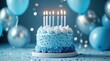 © saichon - A blue birthday cake with candles on it, surrounded by balloons and confetti, set against an elegant background.