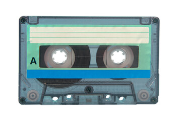 old transparent plastic music cassette on a blue surface