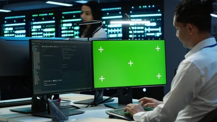 Poster - engineer in data center monitoring security threats using mockup computer, implementing cybersecurit