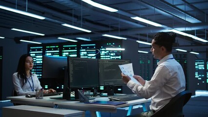 Poster - system administrator in data center maintaining accurate paperwork of hardware, generating reports. 