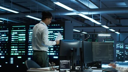 Poster - admin in data center working with colleague to maintaining accurate documentation of equipment, gene