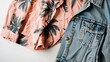 © TheWaterMeloonProjec - Summer ensemble Pink jumpsuit with palm trees design paired with a blue denim jacket on white surface View from above with empty space
