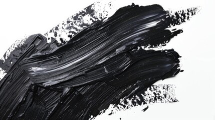 Wall Mural - A close-up shot of black paint on a white surface