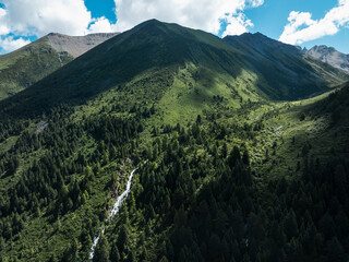 Wall Mural - Aerial view of beautiful forest and waterfall landscape