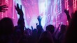 © kimly - Audience cheering and dancing amidst immersive concert visuals.