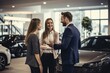 © Rawpixel.com - Young couple talking car showroom vehicle.