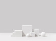 © Dmytro - Minimalist white geometric product presentation scene for product photography made with gypsum cubes, steps and spheres in elegant arrangement. Studio photography.