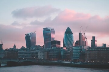 Wall Mural - Skyscrapers of the City of London over the Thames river at sunset in England.