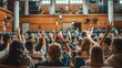 © amorn_m - Audience Members Raising Hands in a Lecture Hall.
