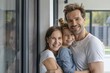 © Thanaporn - Close-up of happy family smiling at the camera. Stand next to an open window with a modern screen and frame.