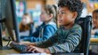 © spyrakot - Child with Physical Disabilities Using Adaptive Computer in Classroom Assisted by Teacher - Educational Inclusion