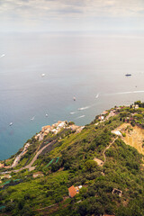 Wall Mural - Scenic Aerial View Of Coastal Village With Boats On Tranquil Sea