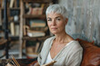 © PHAISITSAWAN - Reading Beautiful beautiful mature middle-aged woman 60 years old with healthy skin.
